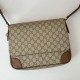 Replica Gucci 821154 GG Emblem medium Men crossbody bag Brown Fake