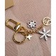 Replica Louis Vuitton LV Snowflakes Bag Charm And Key Holder M80240 Golden